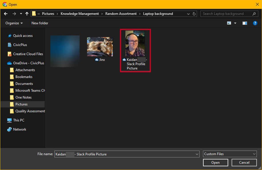The system's file explorer opens to let you select a new image.